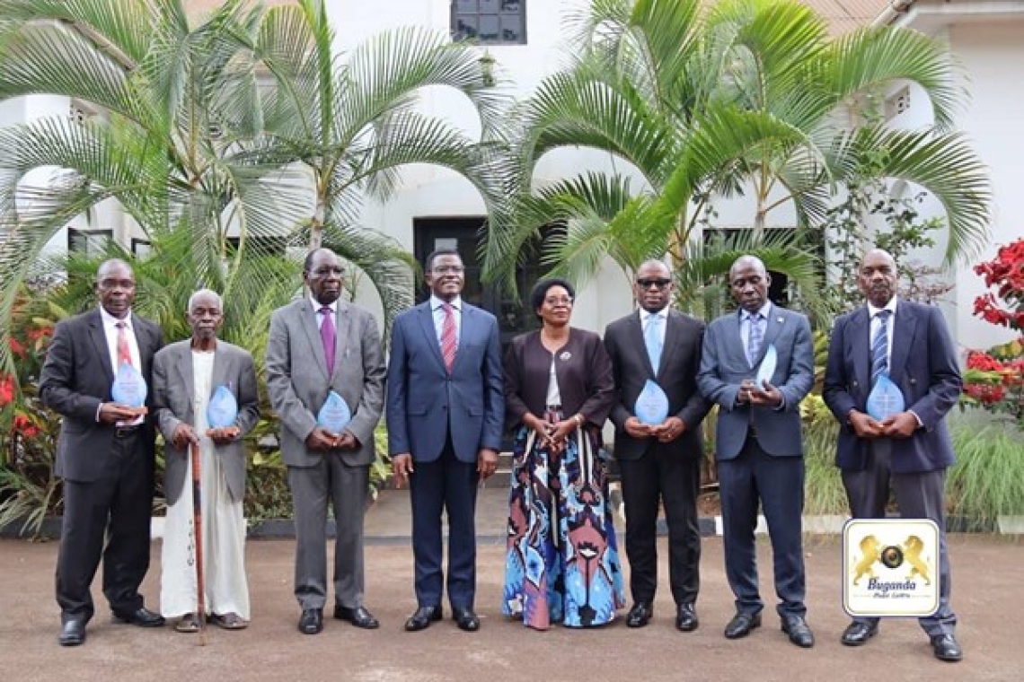 The Katikkiro (center left) with Minister Choltilda Nakate (center right) and officials at the Kisekwa Council meeting Image
